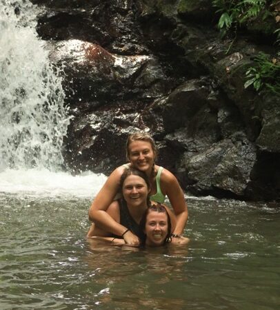 ATV riders at waterfall stop during Manuel Antonio ATV adventure